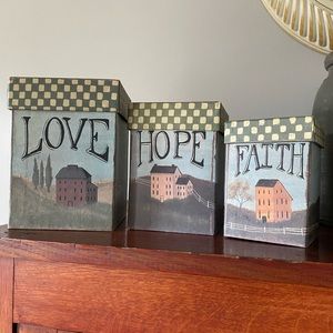Set of three primitive decorative boxes